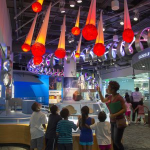 Children learning about outer space at the NC Museum of Natural Sciences